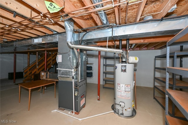 basement with water heater and heating unit