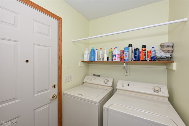 laundry area with separate washer and dryer