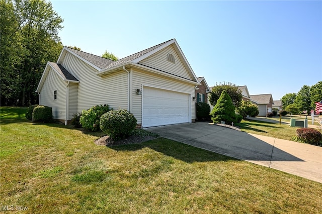 view of property exterior featuring a lawn and a garage