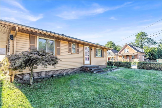 view of front of house with a front yard