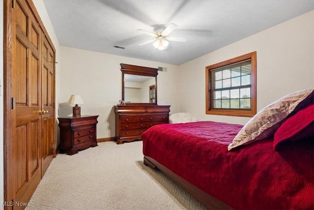 bedroom featuring ceiling fan and carpet floors