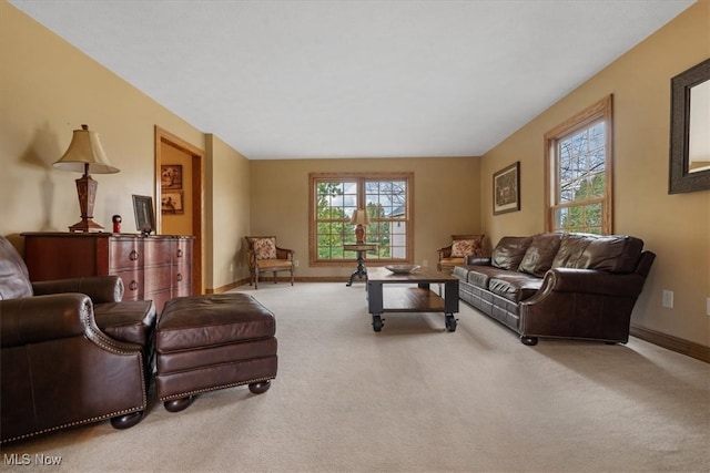 carpeted living room with a wealth of natural light