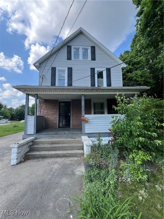 front facade featuring covered porch