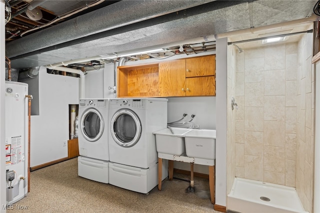 laundry area with separate washer and dryer and gas water heater