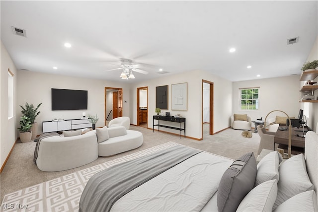 living room featuring ceiling fan and light carpet