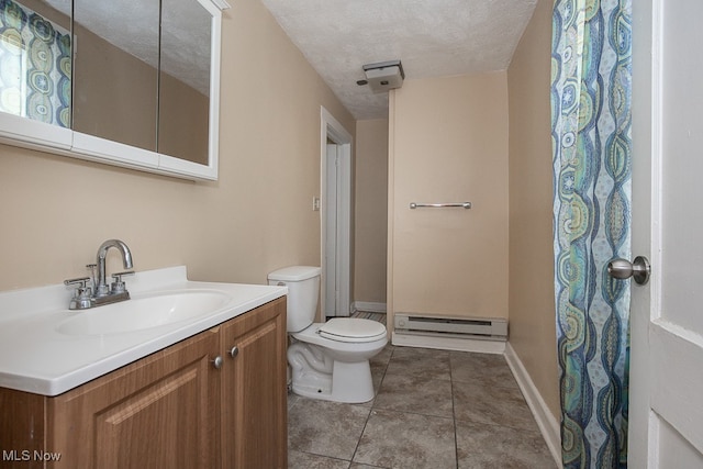 bathroom featuring a textured ceiling, vanity, toilet, and a baseboard radiator