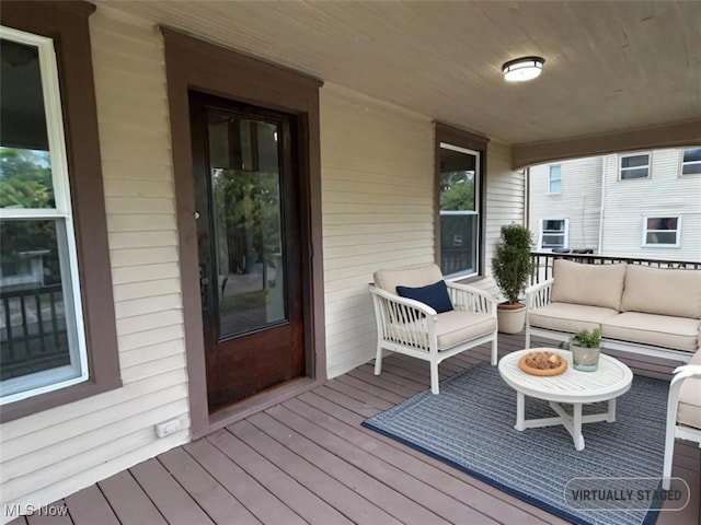 deck with an outdoor living space