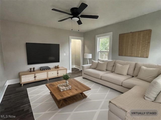 living room with ceiling fan and hardwood / wood-style floors