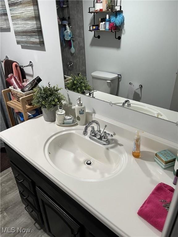 9151 Mentor Ave Unit A14, Mentor, OH 44060 - full bathroom featuring toilet, vanity, and a shower