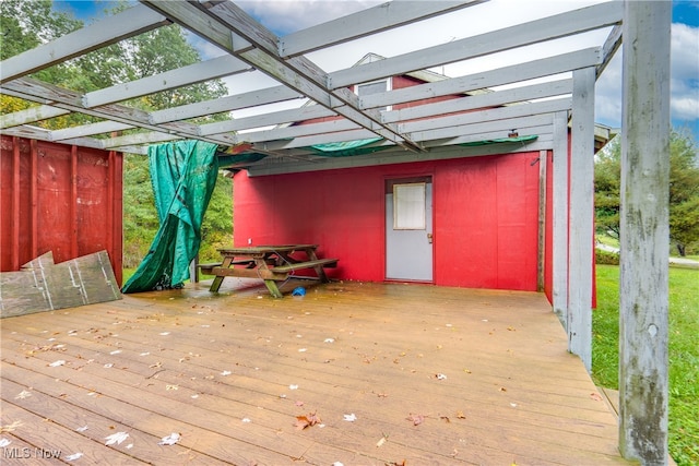 wooden terrace with a pergola