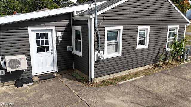 exterior space featuring ac unit