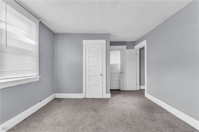 unfurnished bedroom featuring carpet floors