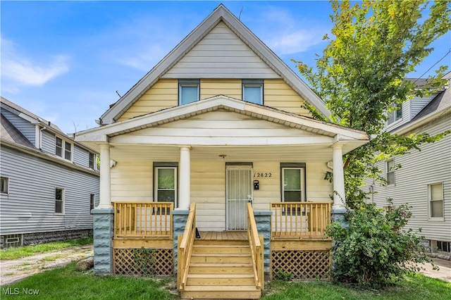 bungalow-style house featuring covered porch