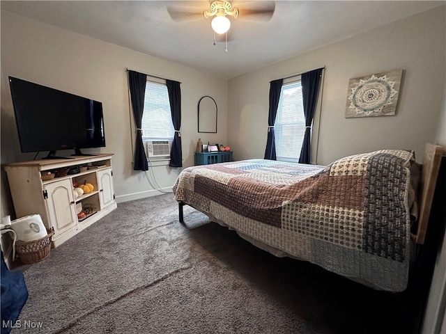 carpeted bedroom with cooling unit, multiple windows, and ceiling fan