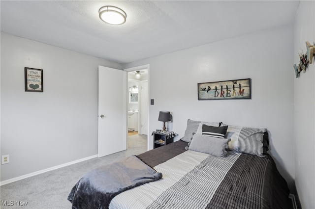 bedroom featuring light colored carpet