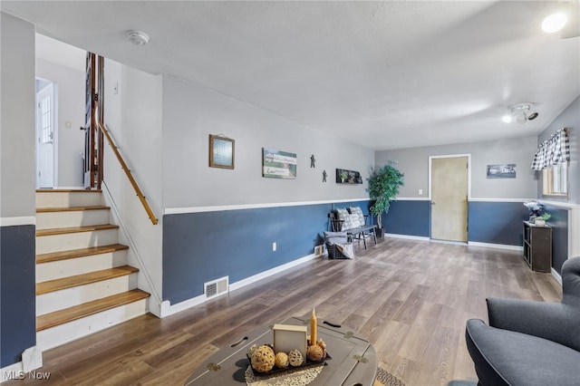 living room featuring wood-type flooring