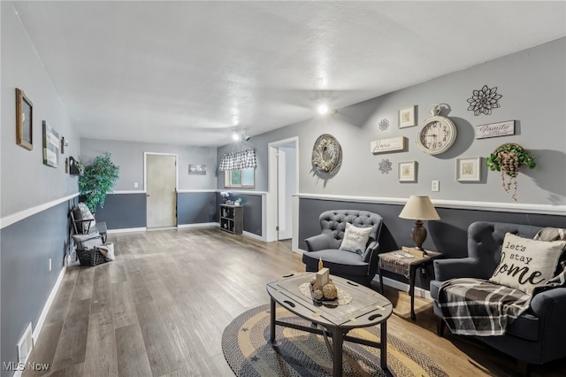 living room with hardwood / wood-style flooring