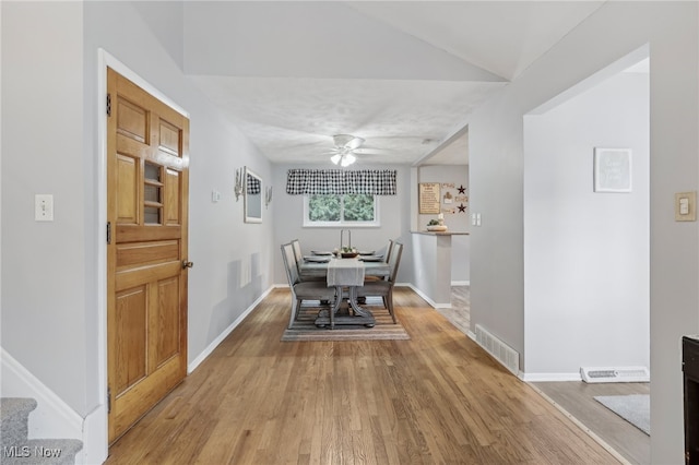 dining area featuring ceiling fan and light hardwood / wood-style flooring