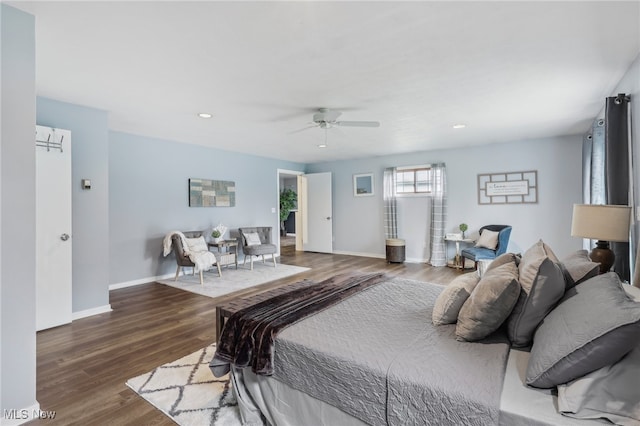 bedroom featuring ceiling fan and dark hardwood / wood-style flooring