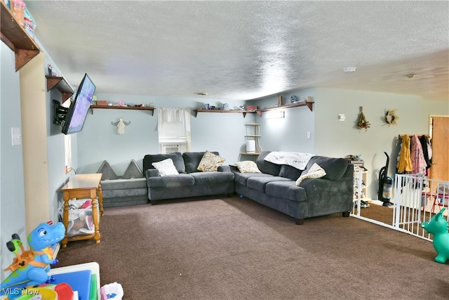 carpeted living room featuring a textured ceiling