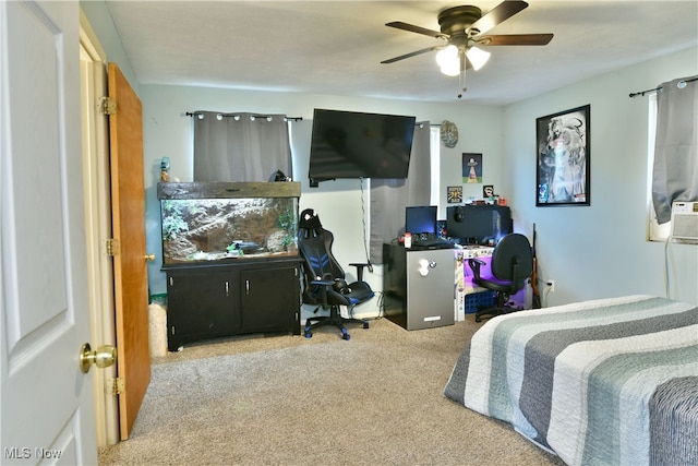 bedroom with ceiling fan and carpet flooring