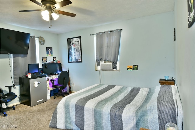 bedroom with carpet floors, cooling unit, a textured ceiling, and ceiling fan