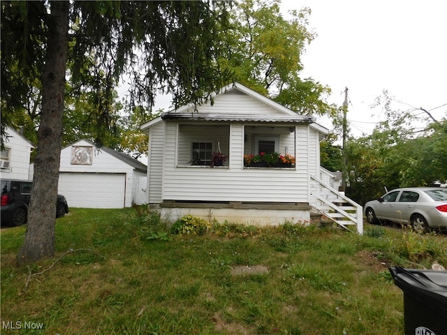 view of front facade with an outdoor structure and a garage