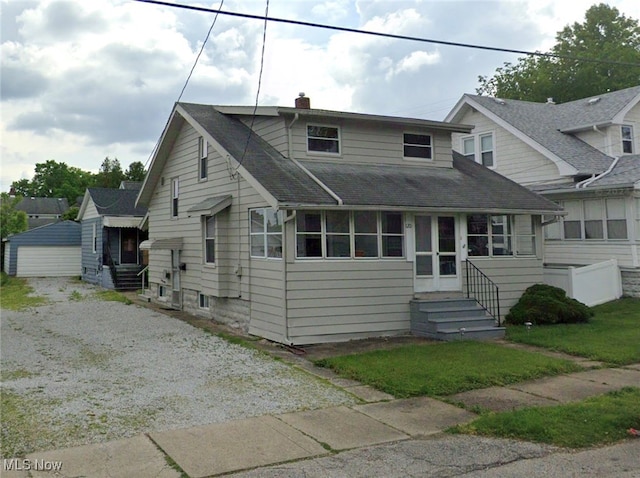 view of front facade featuring an outdoor structure