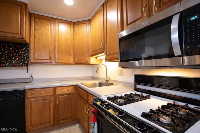 kitchen featuring black appliances and sink