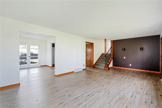 empty room featuring light hardwood / wood-style floors