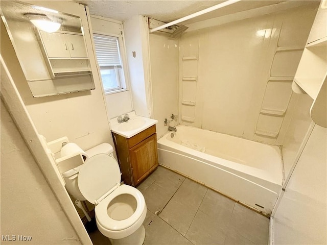 full bathroom with washtub / shower combination, vanity, toilet, and tile patterned floors