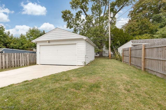 garage featuring a yard