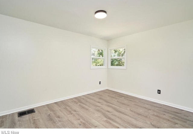 empty room featuring light hardwood / wood-style floors