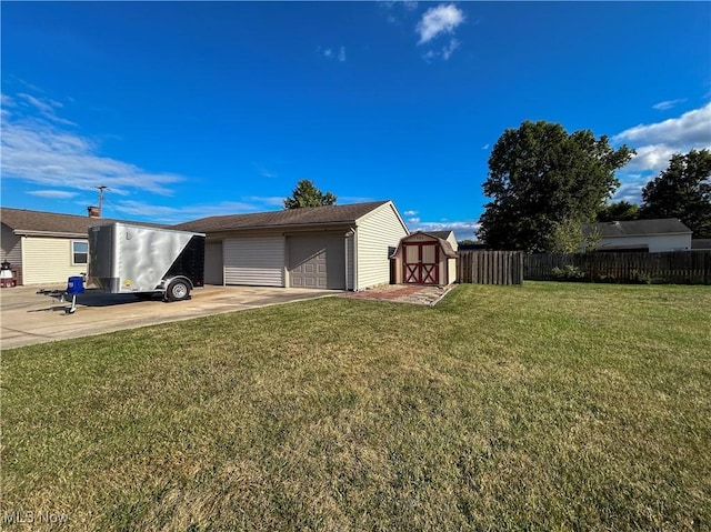 exterior space with a storage unit and a yard