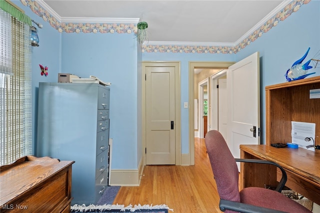 office featuring light hardwood / wood-style flooring and ornamental molding