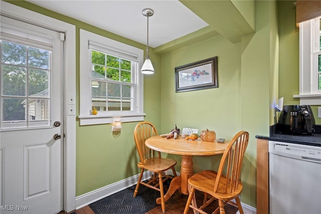 dining space featuring wood-type flooring