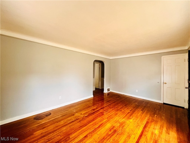 empty room featuring hardwood / wood-style floors