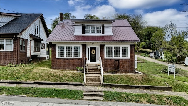 view of front of house with a front yard