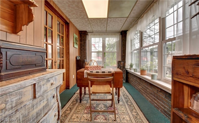 sunroom featuring plenty of natural light