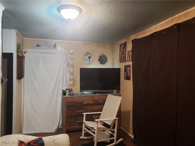 interior space with a textured ceiling