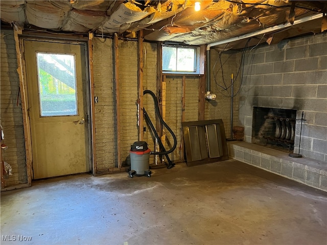 basement with a fireplace