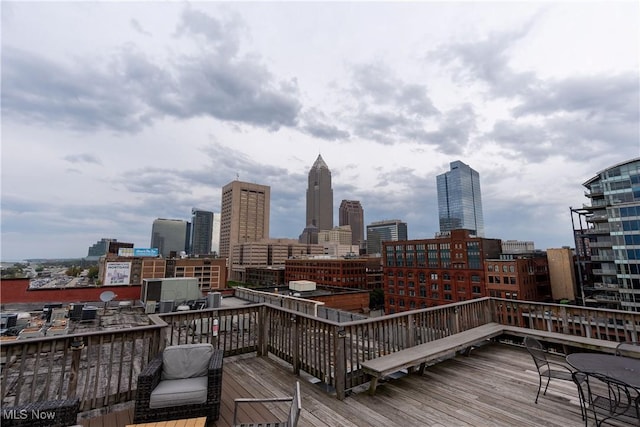 1133 W 9th St Unit 701, Cleveland, OH 44113 - wooden deck featuring a skyline view