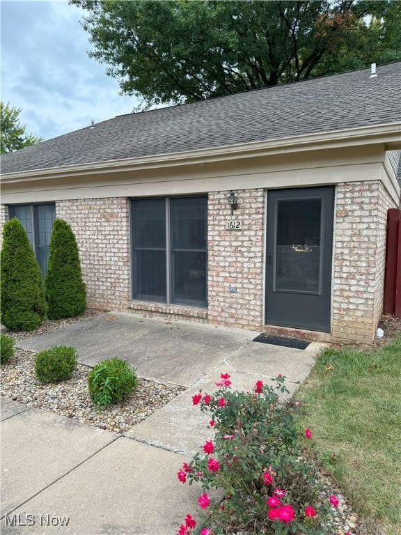 property entrance with a patio