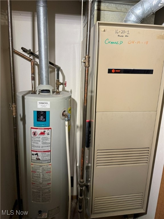 utilities featuring gas water heater and heating unit