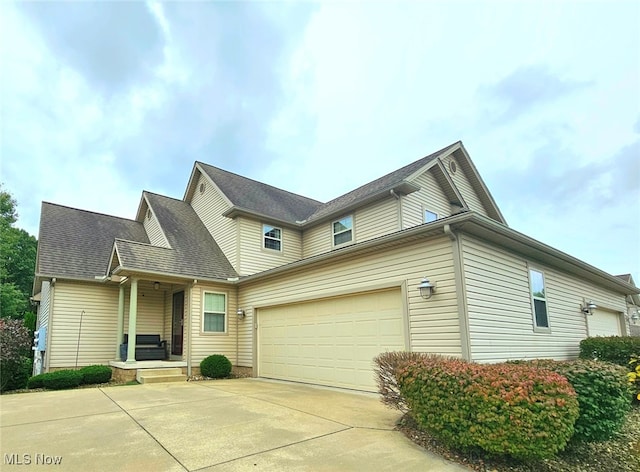 front of property with a garage