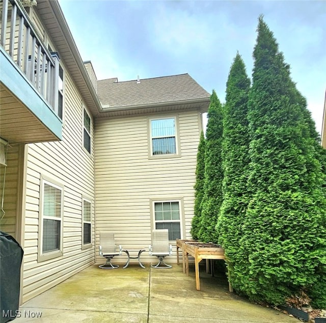 back of house with a patio area