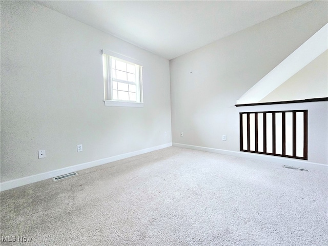 empty room with carpet flooring