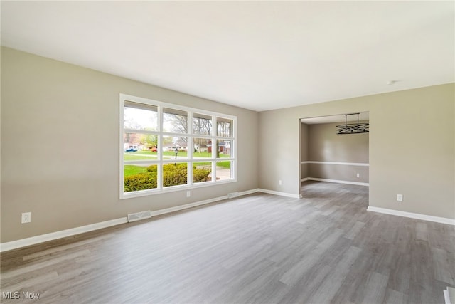 empty room with light wood-type flooring