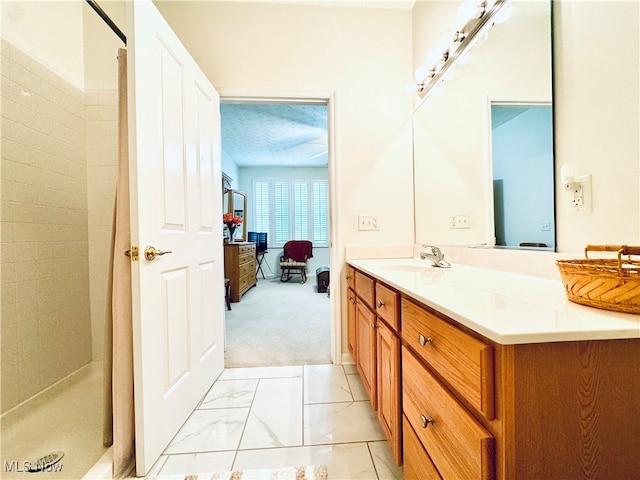 bathroom featuring a shower with curtain and vanity