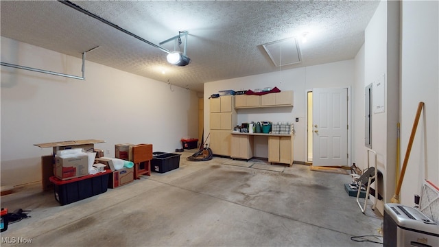 garage featuring a garage door opener